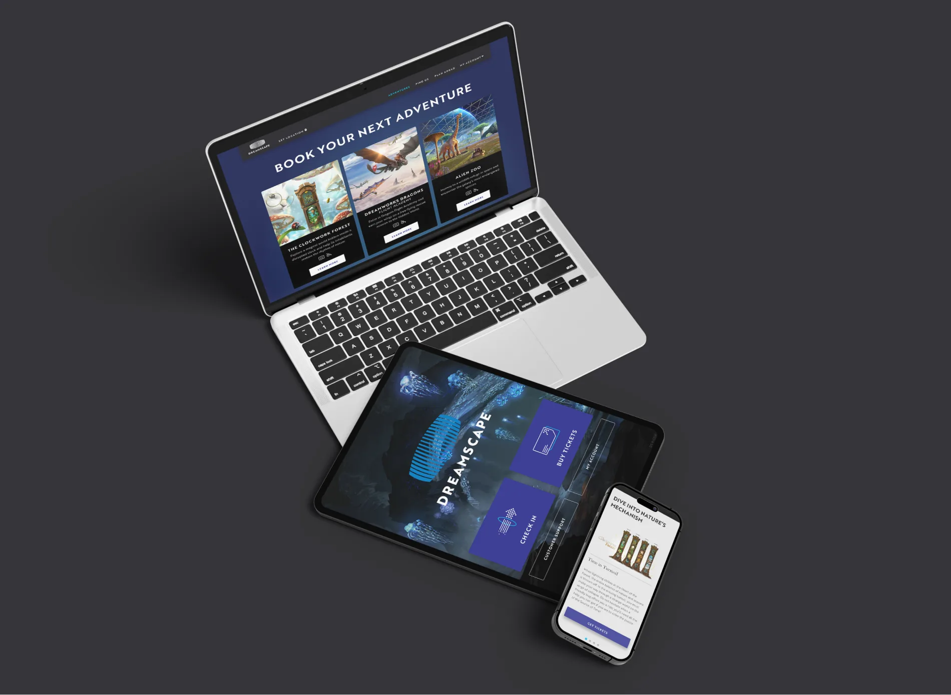 Dreamscape website, iPad kiosk, and mobile designs shown on a laptop, tablet, and phone